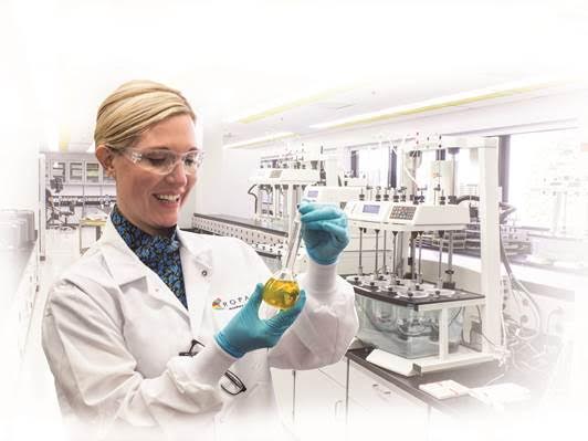 Image of a woman working in a laboratory.